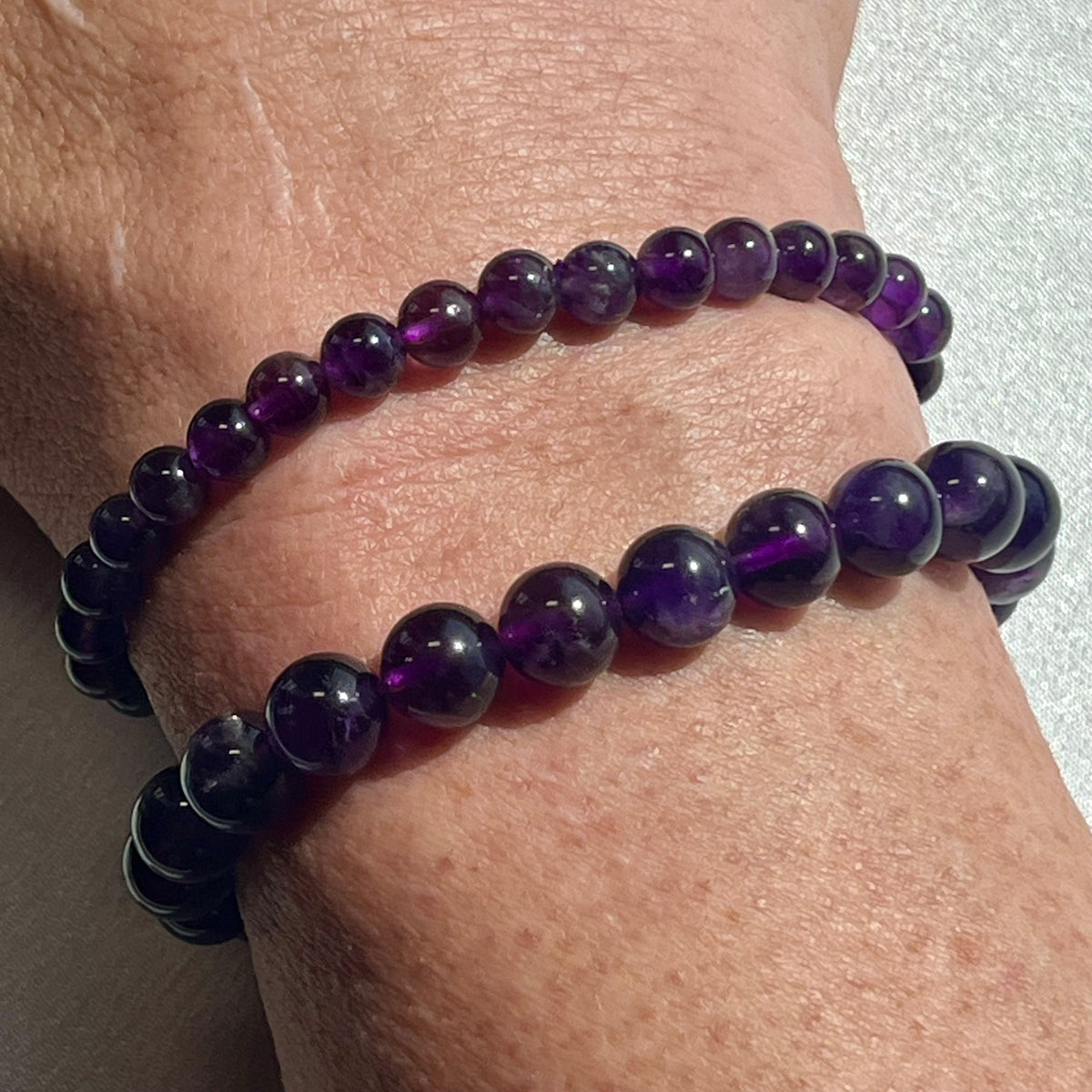 Amethyst (dark) smooth round 6mm, 8mm bead stretch bracelet; February birthstone