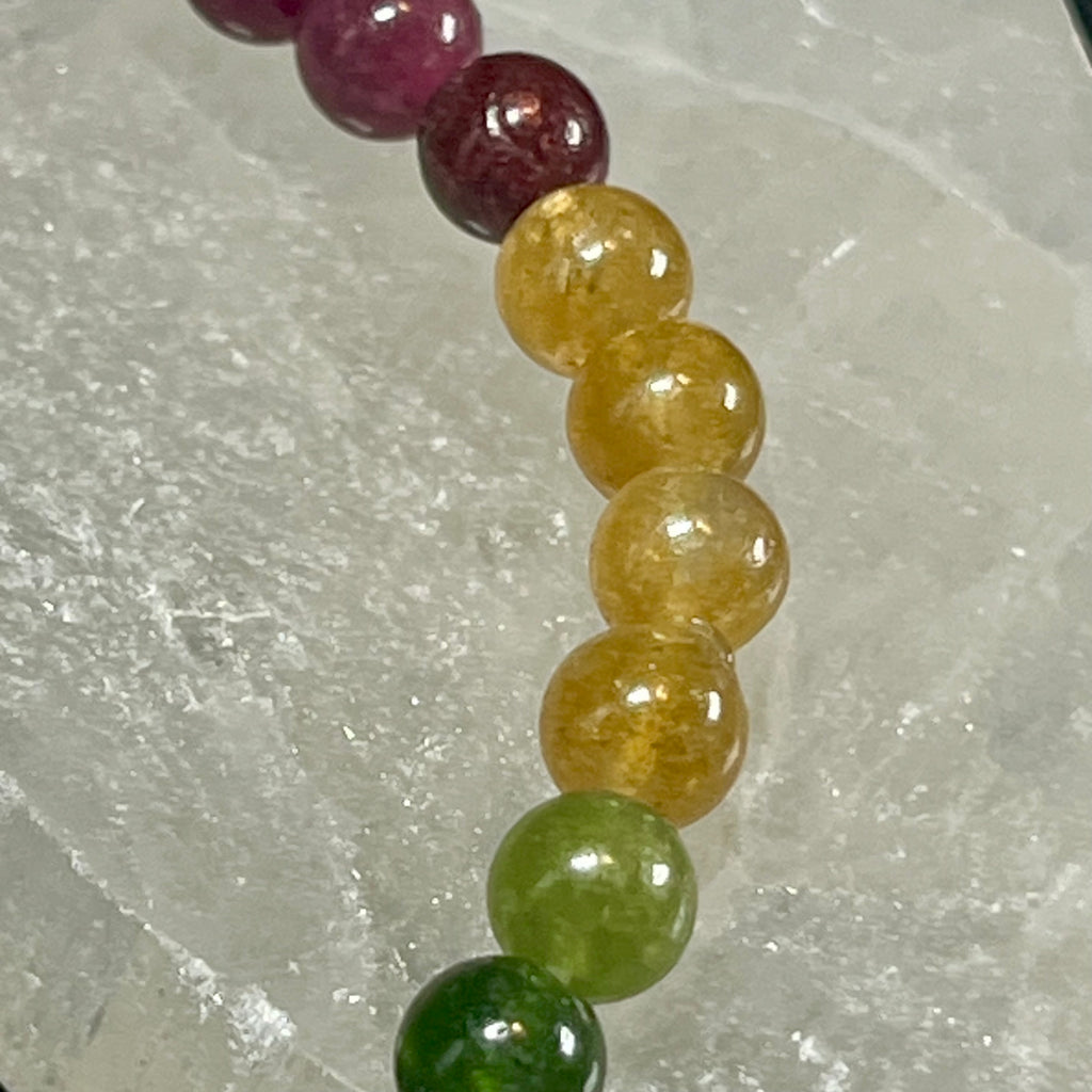 High-quality Multi-Tourmaline ombre-style smooth round 6mm bead stretch bracelet