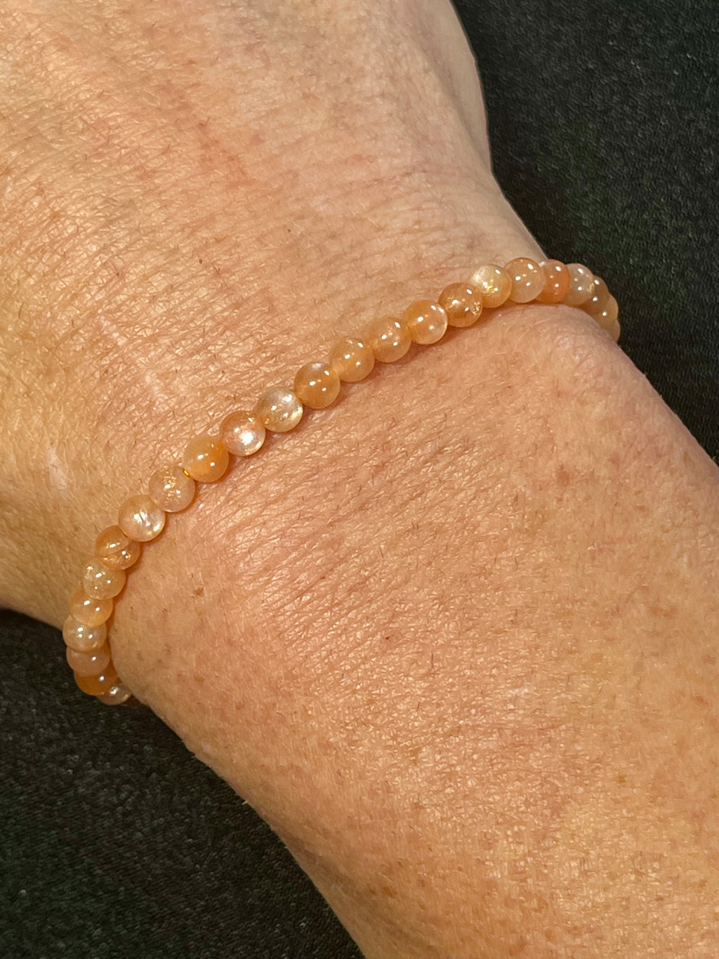 Sunstone w/ strong Moonstone-like adularescence smooth round 4mm bead stretch bracelets (premium grade)
