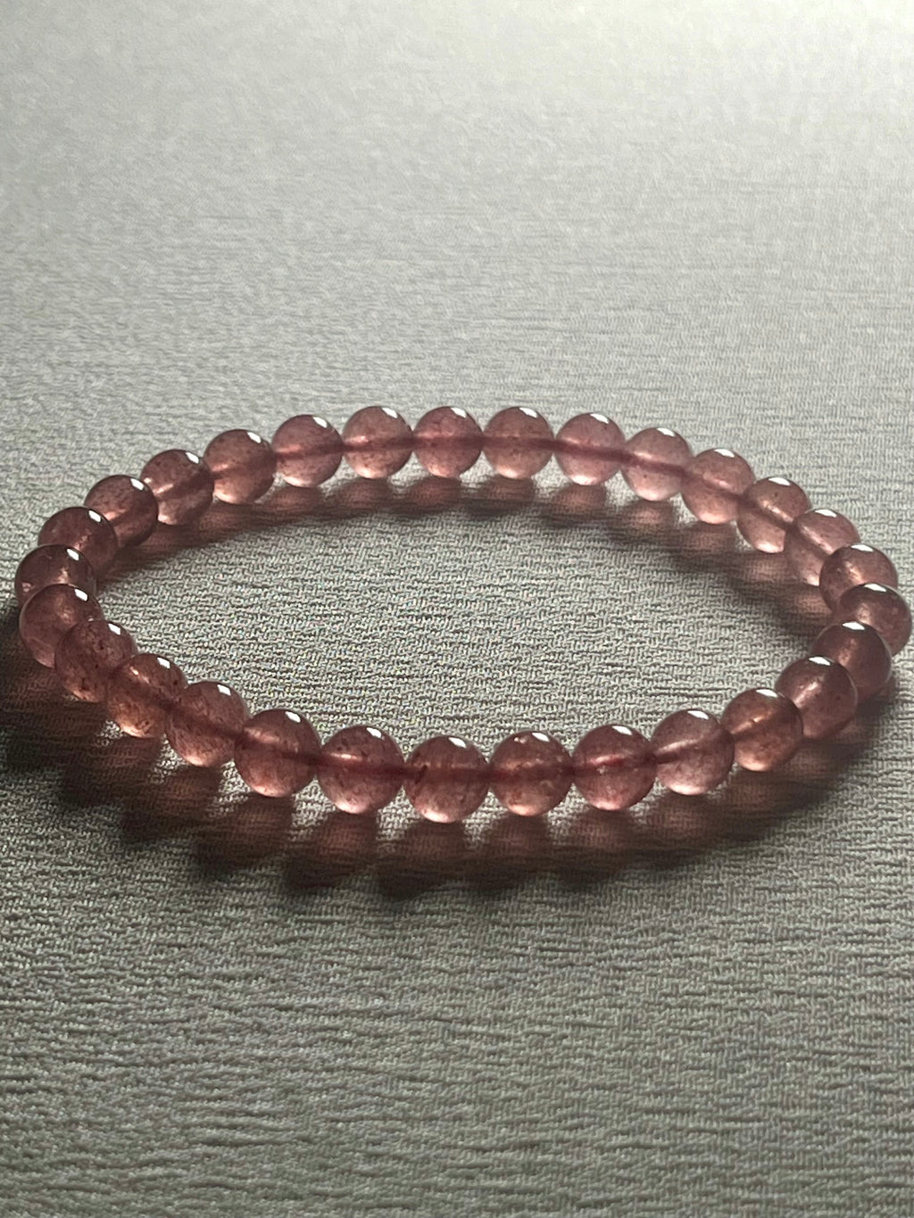 Strawberry Quartz smooth round 6mm bead stretch bracelet (AA grade)