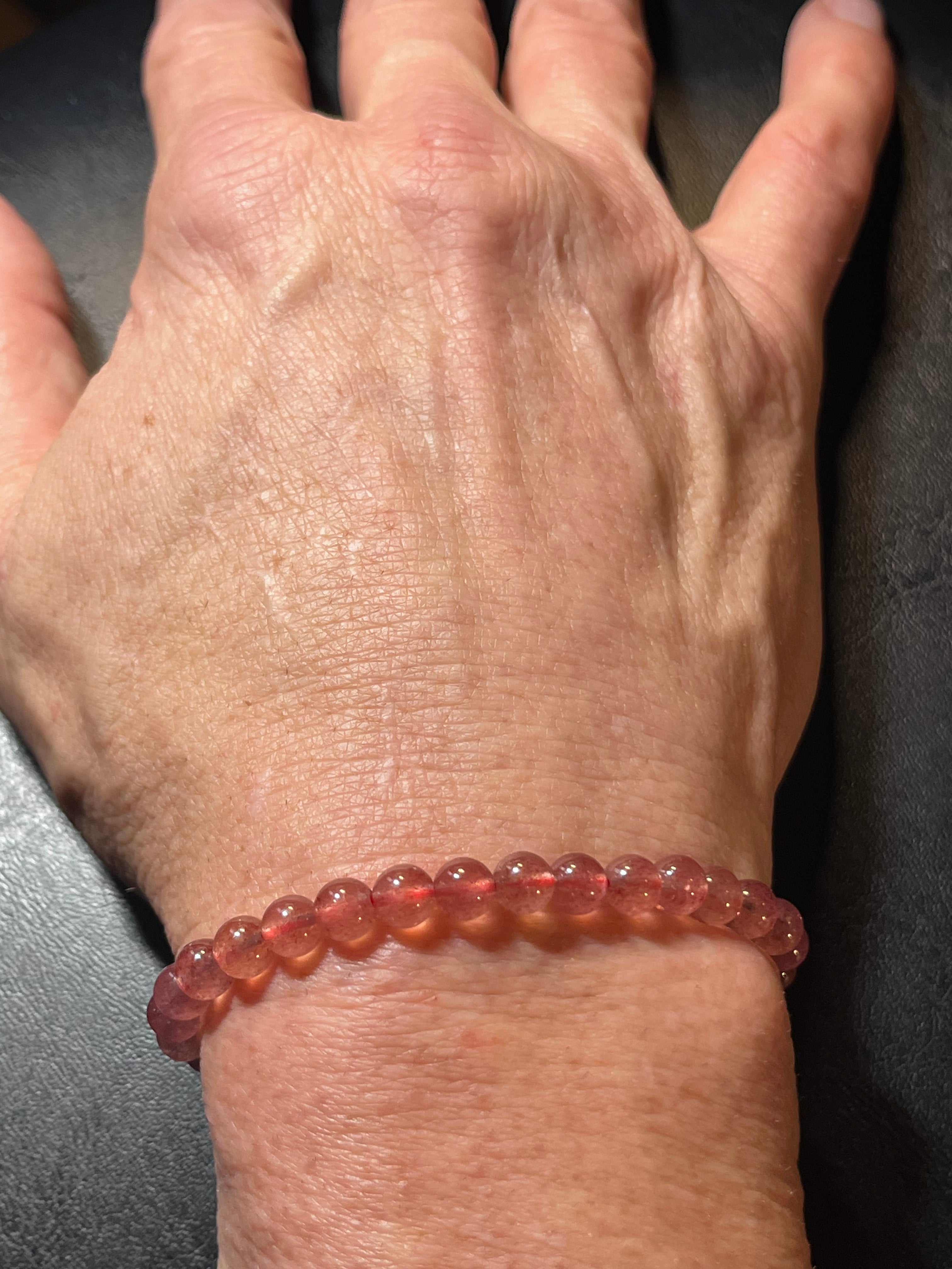 Strawberry Quartz smooth round 6mm bead stretch bracelet (AAA grade)