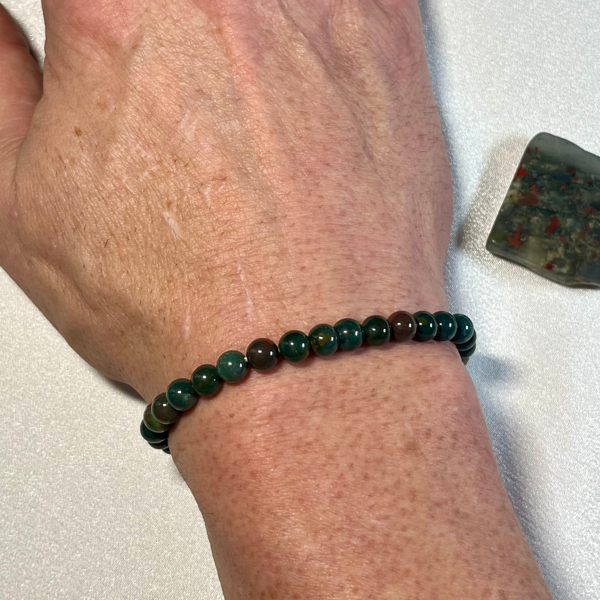 Bloodstone (Heliotrope) smooth round 6mm and 8mm bead stretch bracelet; alternative March birthstone