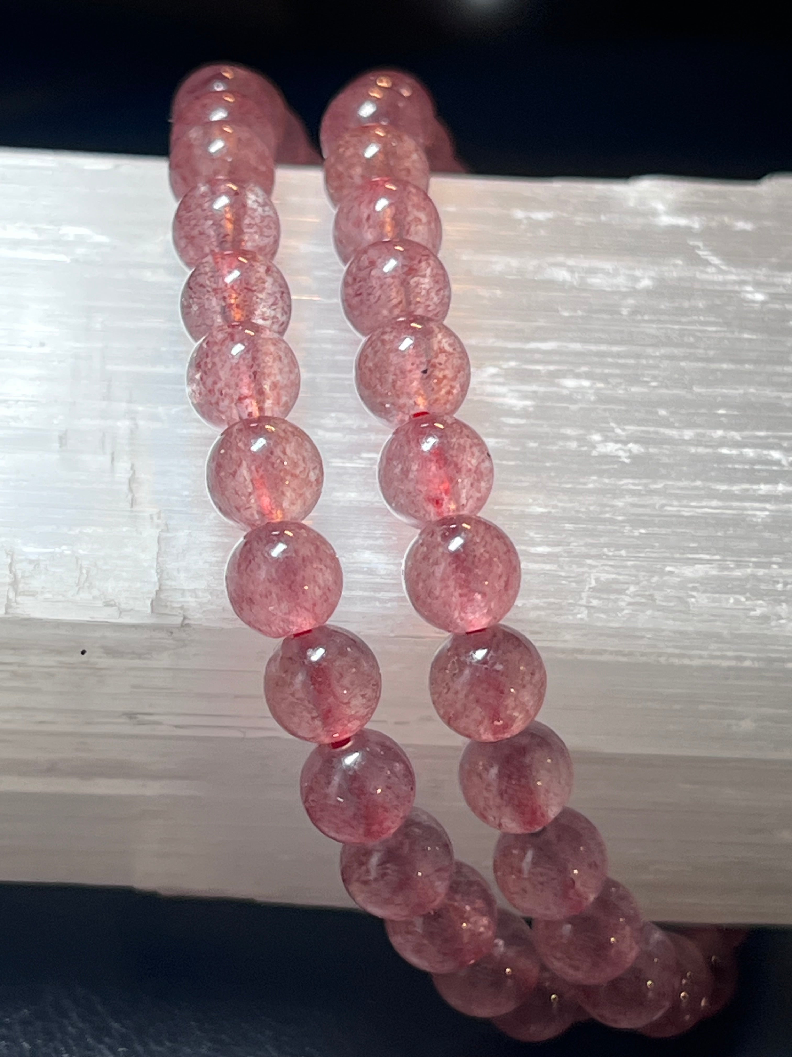 Strawberry Quartz smooth round 6mm bead stretch bracelet (AAA grade)