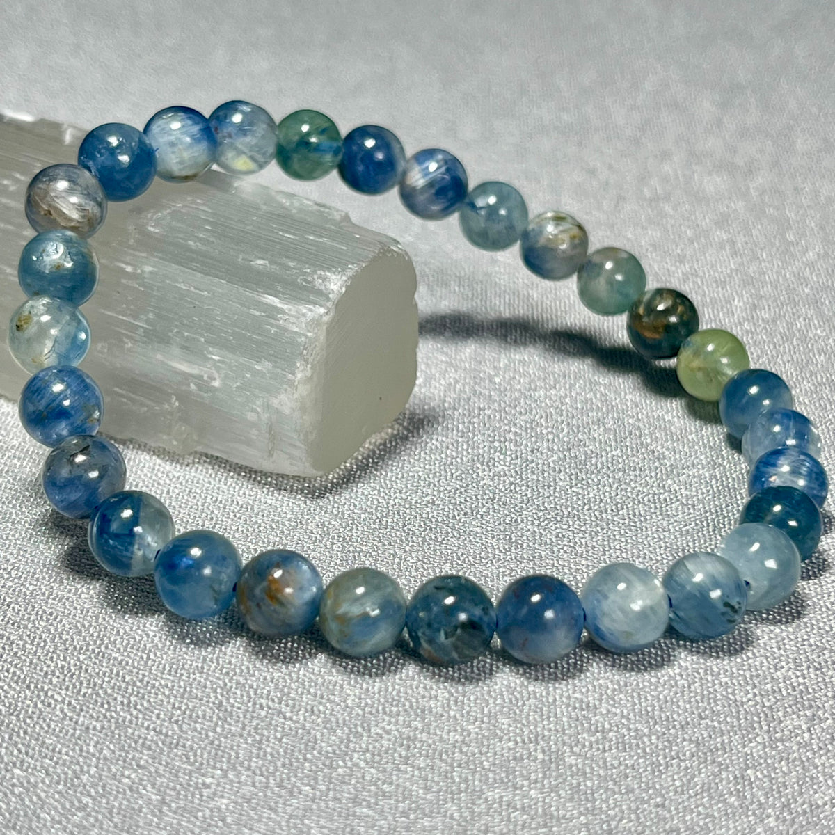 Kyanite Mix smooth round 6mm bead stretch bracelet