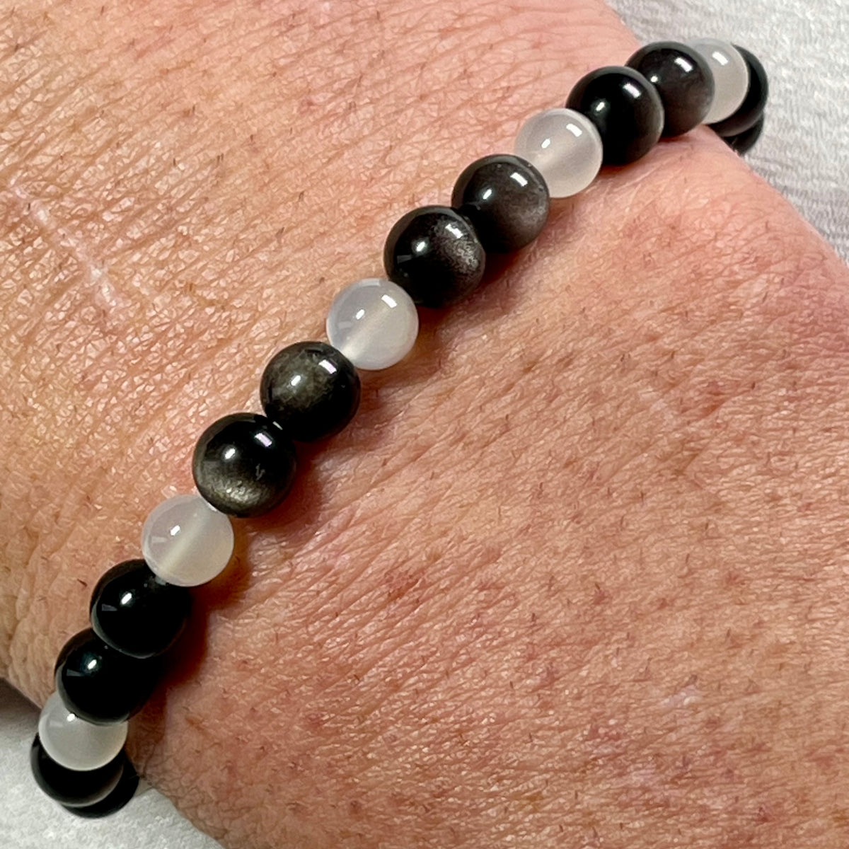 High-quality Silver Sheen Obsidian & White Moonstone smooth round 6mm bead stretch bracelet
