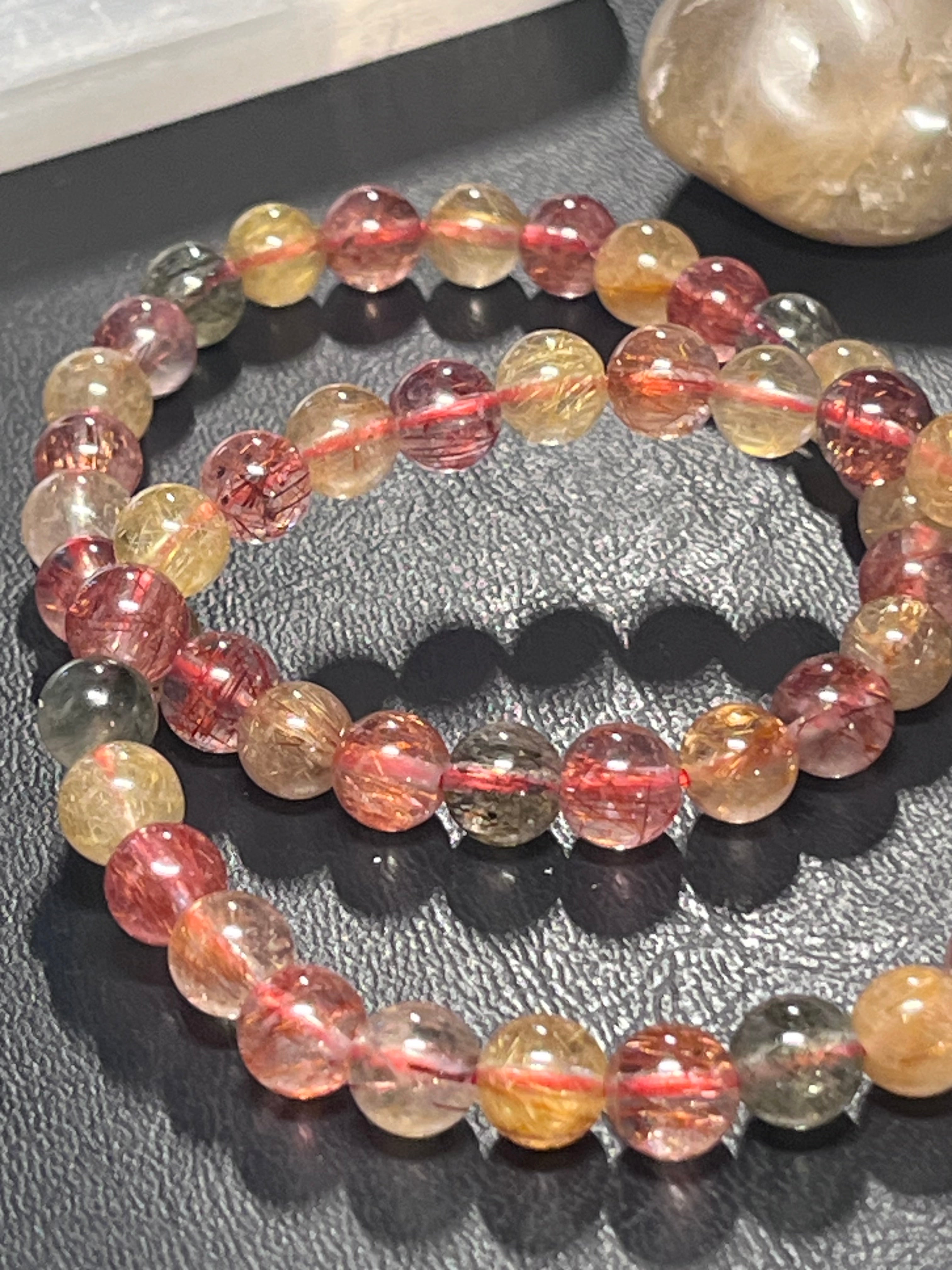 Strawberry, Golden, & Green Rutilated Quartz smooth round 7mm bead stretch bracelet