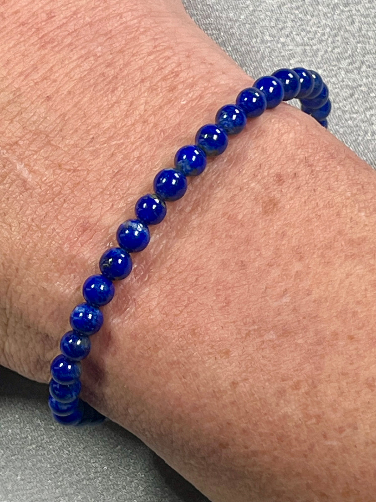 Lapis Lazuli smooth round 5mm bead stretch bracelet (AA grade); alternative September birthstone