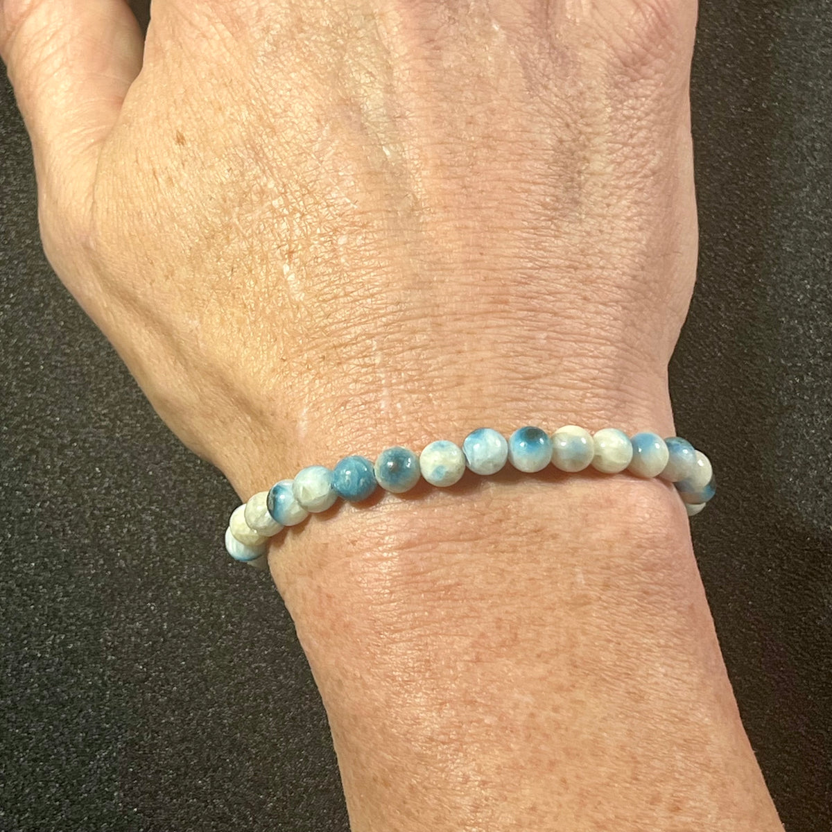 Blue Ice (Glacierite)smooth round 6mm bead stretch bracelet (A grade)