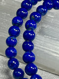 Lapis Lazuli smooth round 5mm bead stretch bracelet (AA grade); alternative September birthstone