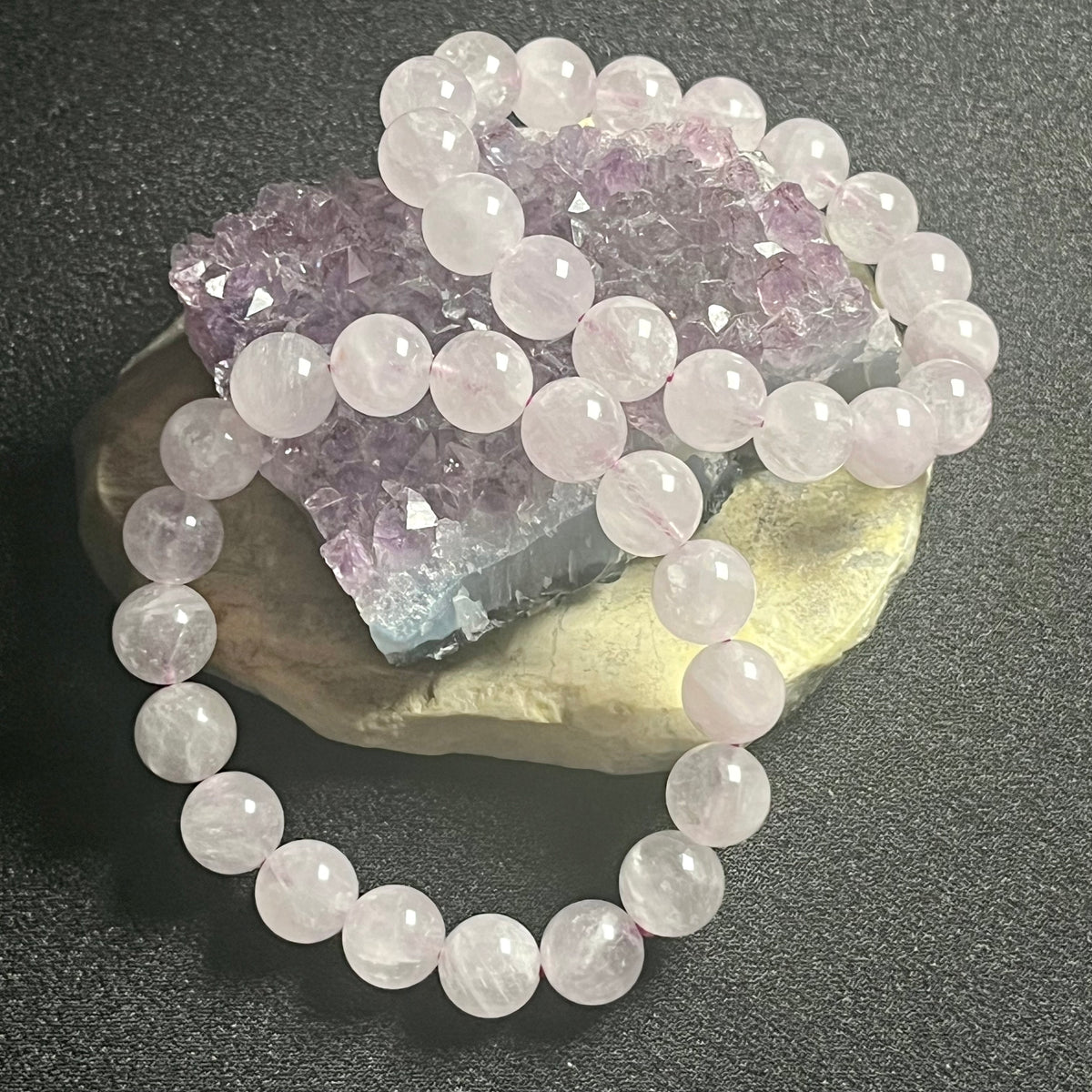 Lavender Amethyst smooth round 10mm bead single stretch bracelet; February birthstone
