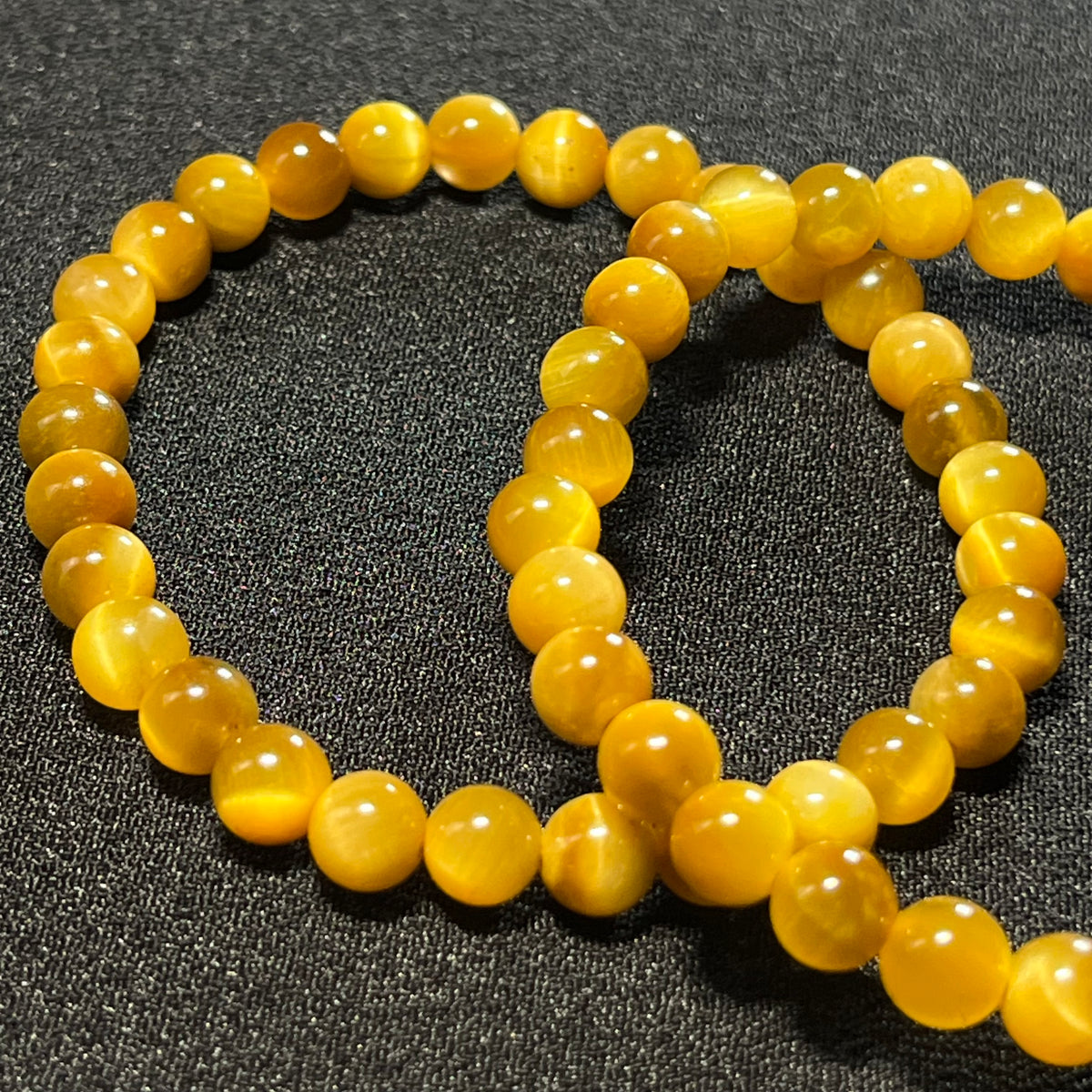 Golden Tiger’s Eye smooth round 4mm and 6mm bead stretch bracelet