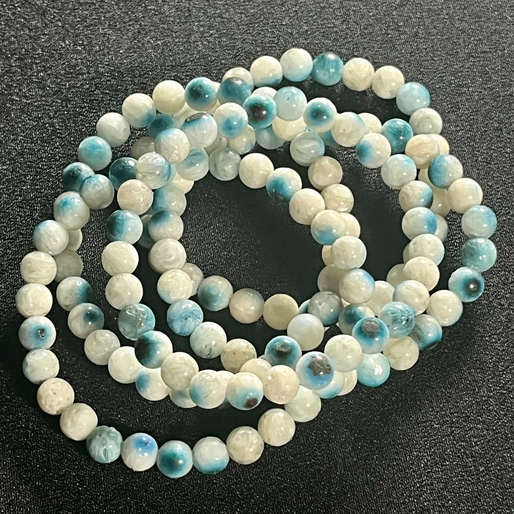 Blue Ice (Glacierite)smooth round 6mm bead stretch bracelet (A grade)