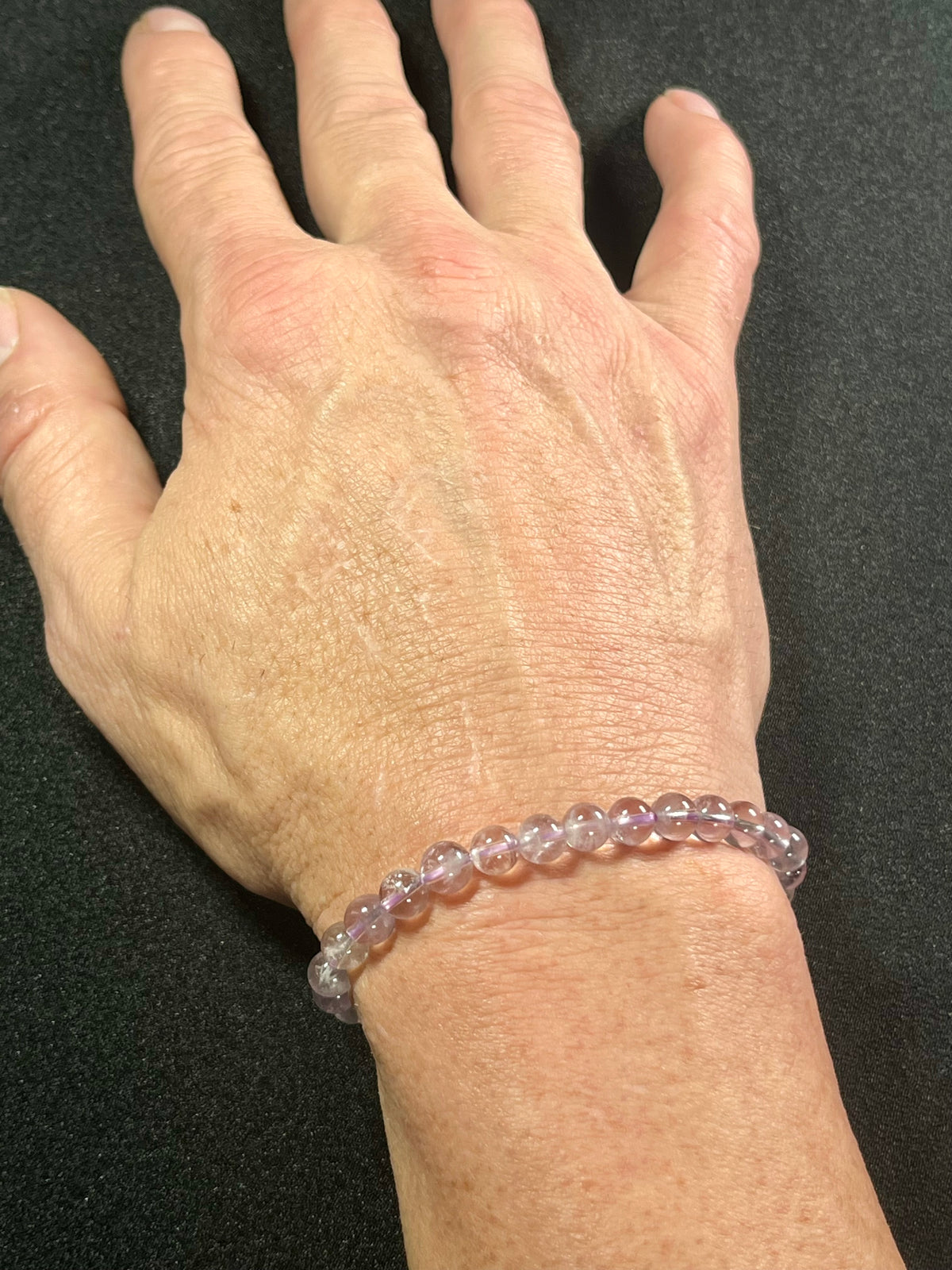 Light Lilac Amethyst smooth round 6mm bead stretch bracelet high clarity (AA grade); February birthstone