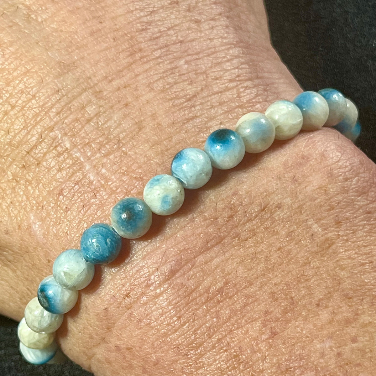 Blue Ice (Glacierite)smooth round 6mm bead stretch bracelet (A grade)