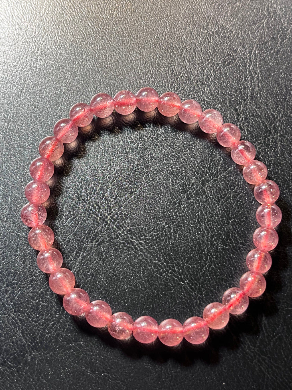 Strawberry Quartz smooth round 6mm bead stretch bracelet (AAA grade)