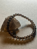Smoky Quartz smooth round 6mm bead stretch bracelet (AA grade)