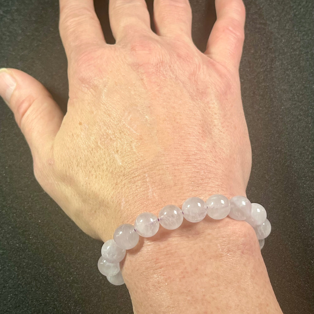 Lavender Amethyst smooth round 10mm bead single stretch bracelet; February birthstone