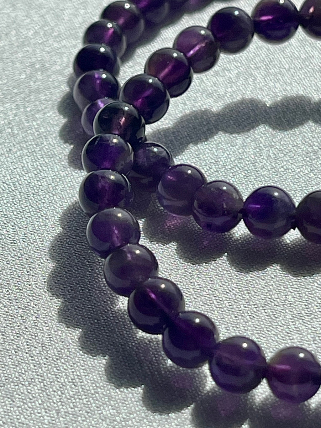 Amethyst (dark) smooth round 6mm, 8mm bead stretch bracelet; February birthstone
