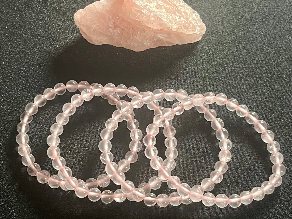 Icy Pink Rose Quartz smooth round 6mm and 8mm bead stretch bracelet; October birthstone