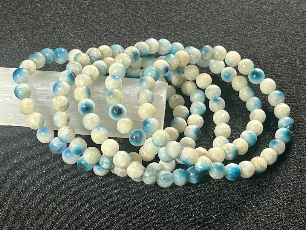 Blue Ice (Glacierite)smooth round 6mm bead stretch bracelet (A grade)