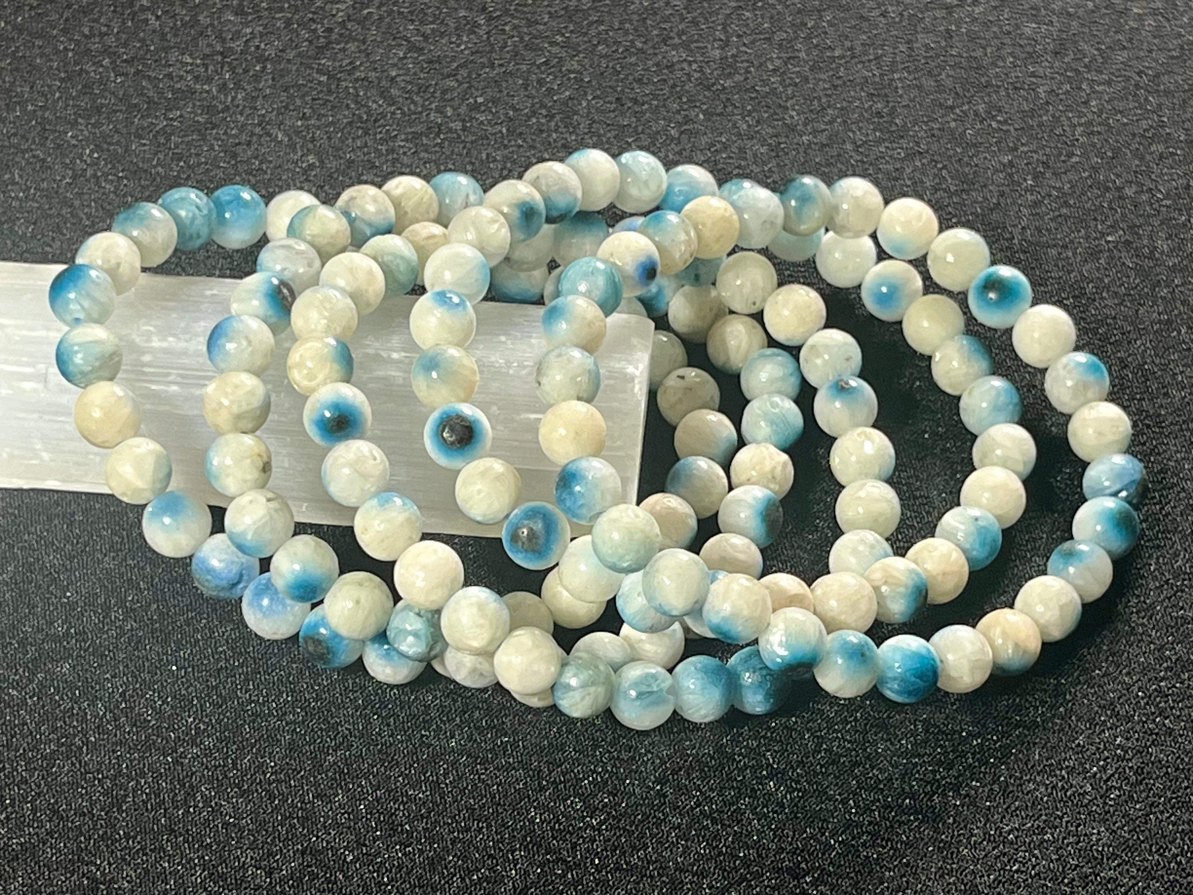 Blue Ice (Glacierite)smooth round 6mm bead stretch bracelet (A grade)