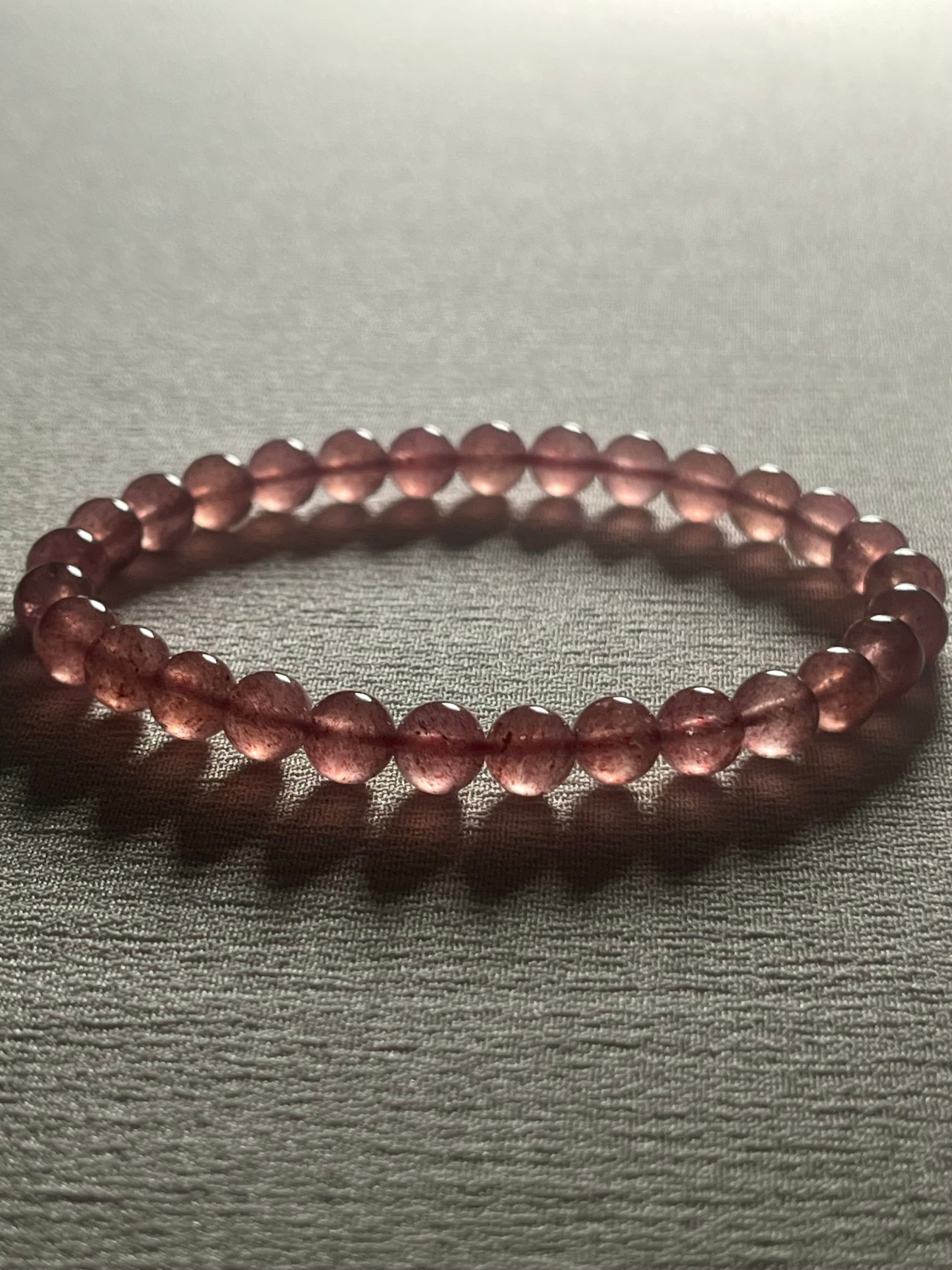 Strawberry Quartz smooth round 6mm bead stretch bracelet (AA grade)