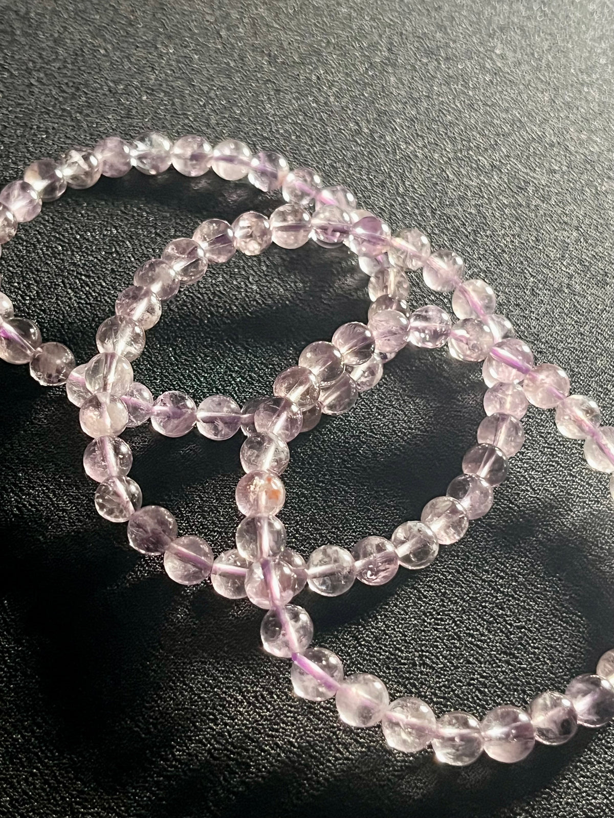 Light Lilac Amethyst smooth round 6mm bead stretch bracelet high clarity (AA grade); February birthstone