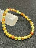 RARE Green Tsavorite Garnet smooth round 5mm bead stretch bracelet (AA grade)