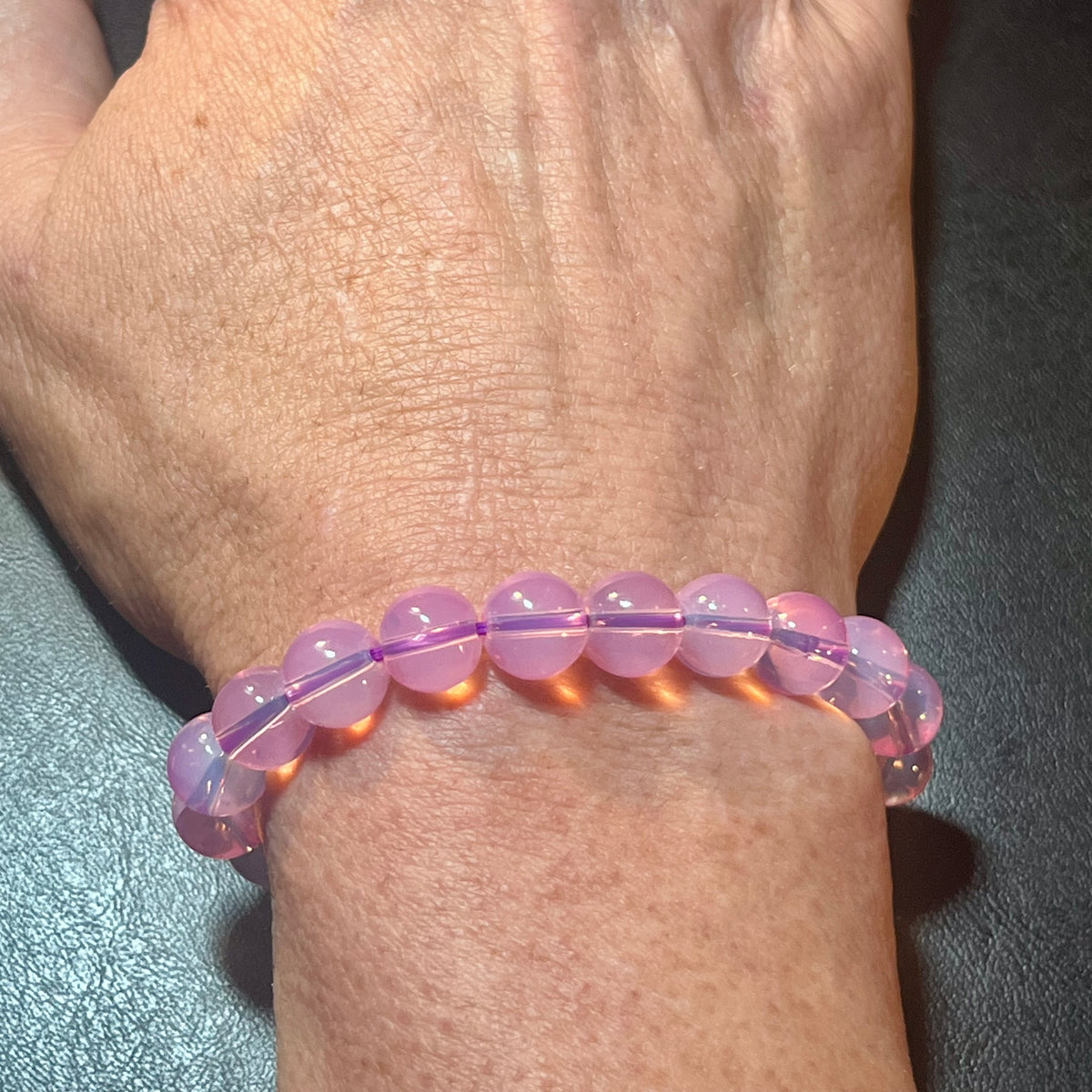 Plum Pink Opalite smooth round 10mm bead stretch bracelet (synthetic)