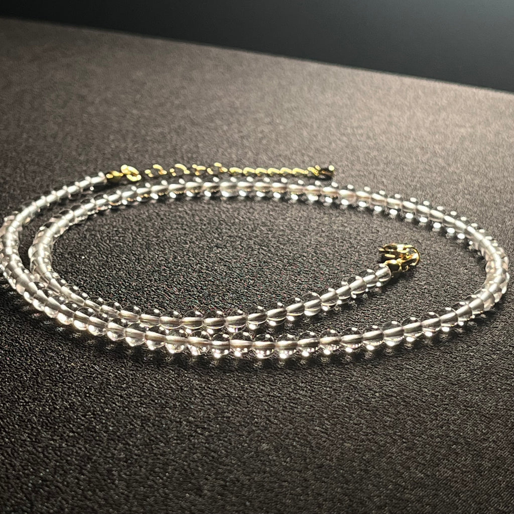 Clear Crystal Quartz smooth round 4mm bead 21” adjustable necklace w/ 18k gold clasp & extension chain; April birthstone (premium grade)
