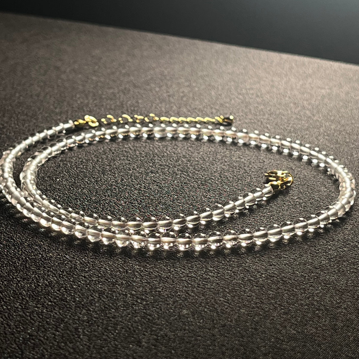Clear Crystal Quartz smooth round 4mm bead 21” adjustable necklace w/ 18k gold clasp & extension chain; April birthstone (premium grade)