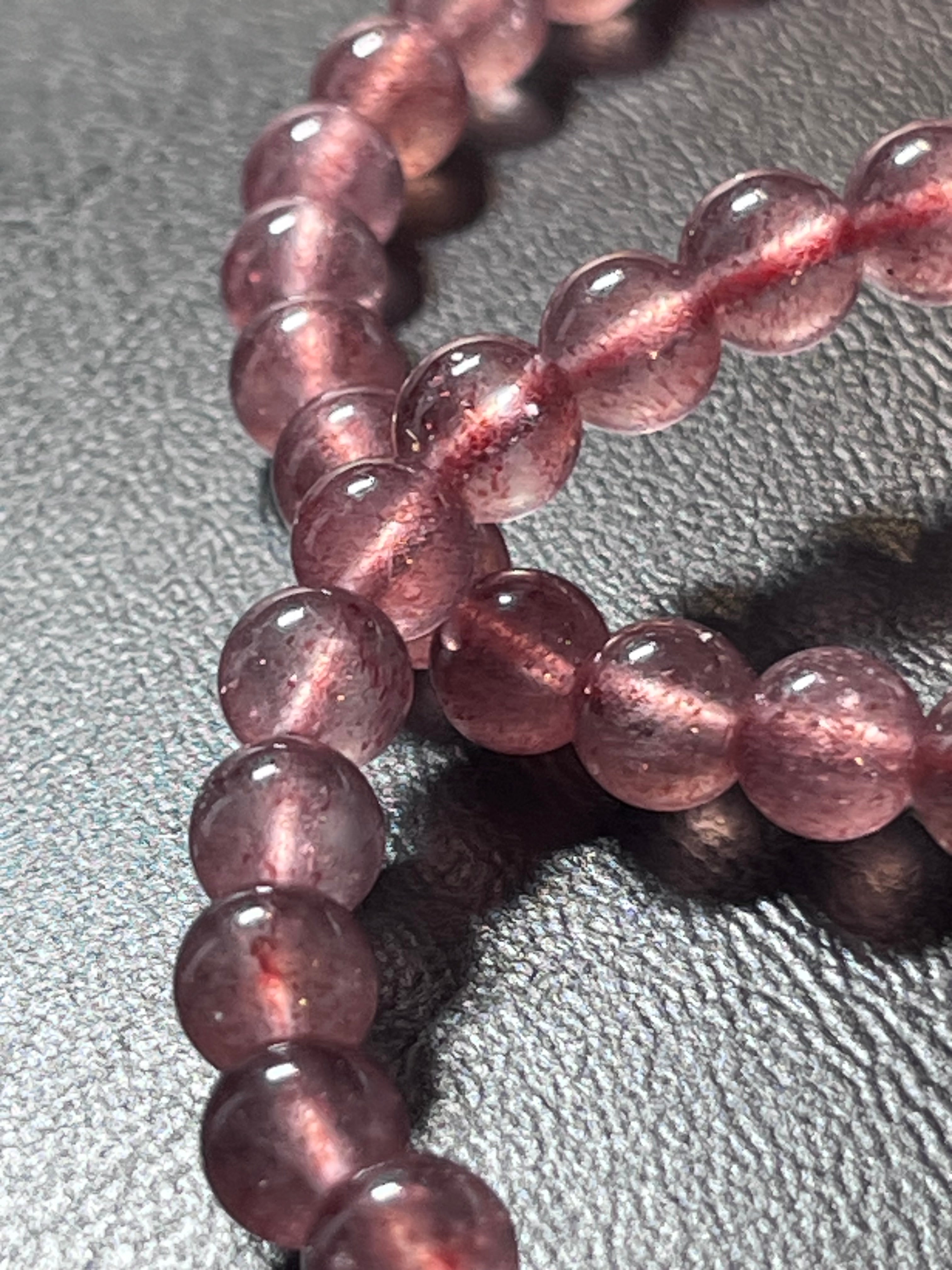 Strawberry Quartz smooth round 6mm bead stretch bracelet (AAA grade)