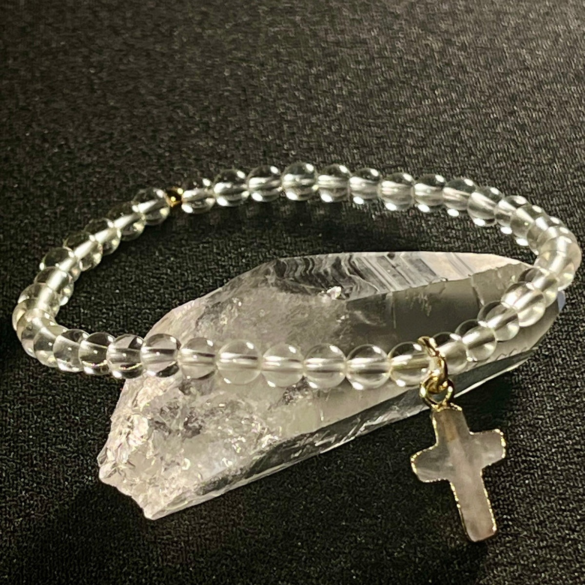 Clear Quartz smooth round 4mm single stretch bracelet w/ Clear Quartz cross charm gold finish & 24k gold spacer