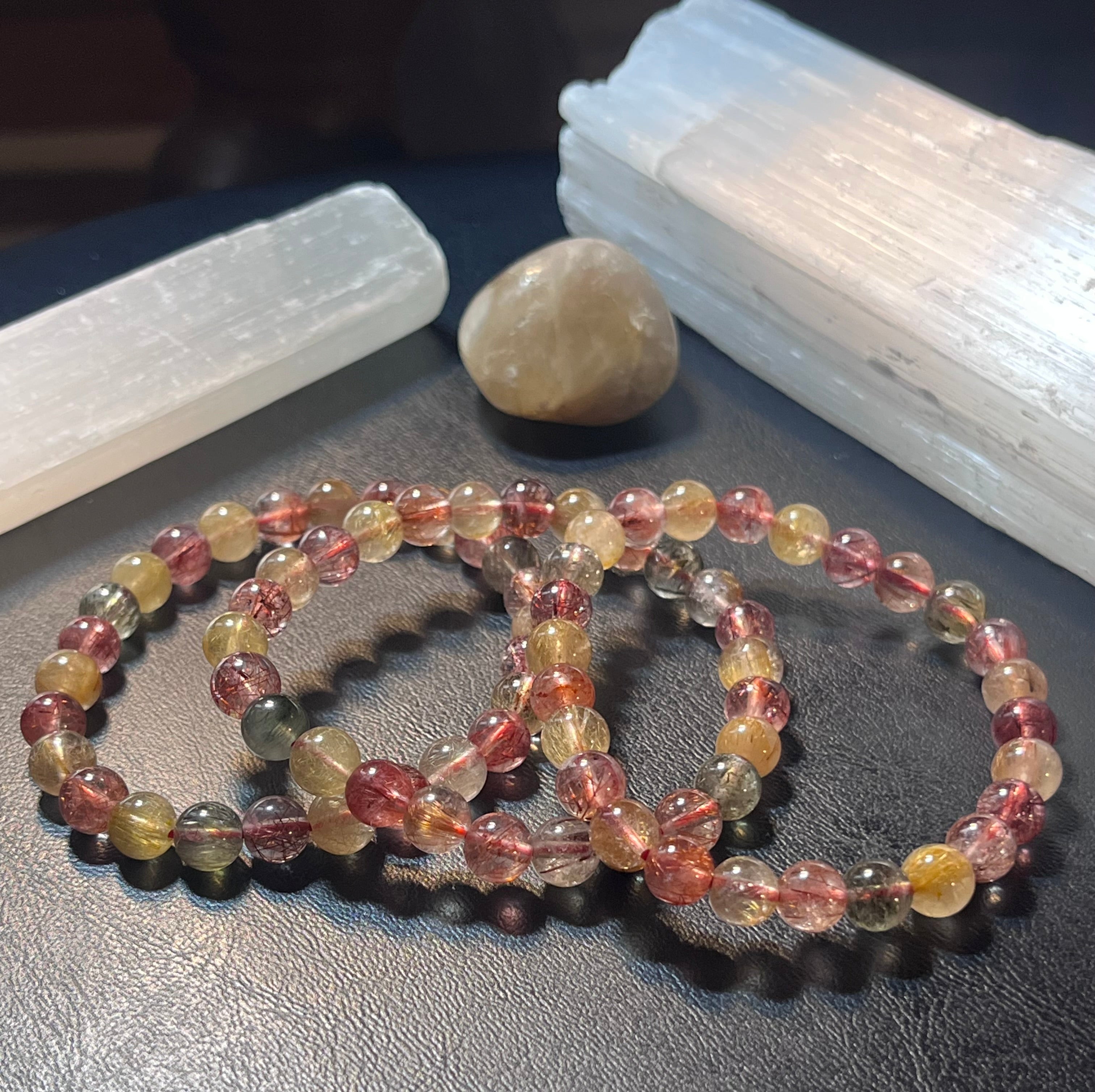 Strawberry, Golden, & Green Rutilated Quartz smooth round 7mm bead stretch bracelet