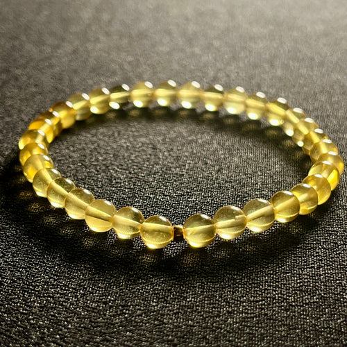 Amber (Light Yellow) w/ 24k gold spacer smooth round 5.5mm bead stretch bracelet