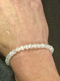 Satin Spar Selenite smooth round 6mm, 8mm bead stretch bracelet (premium grade)