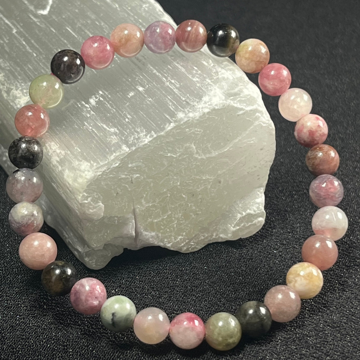 Tourmaline smooth round 6mm bead stretch bracelet; October birthstone