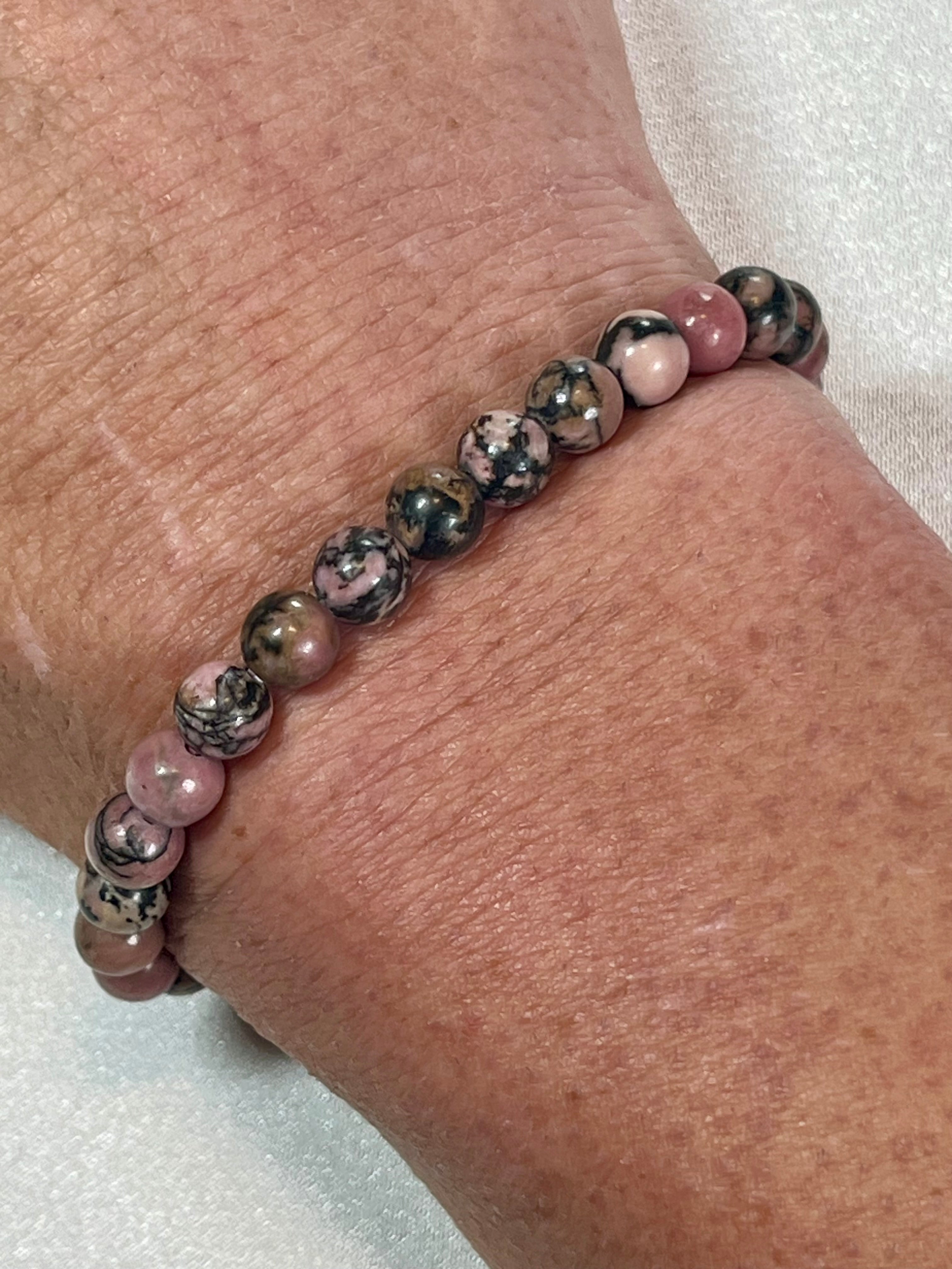 Rhodonite with black matrix smooth round 6mm bead stretch bracelet
