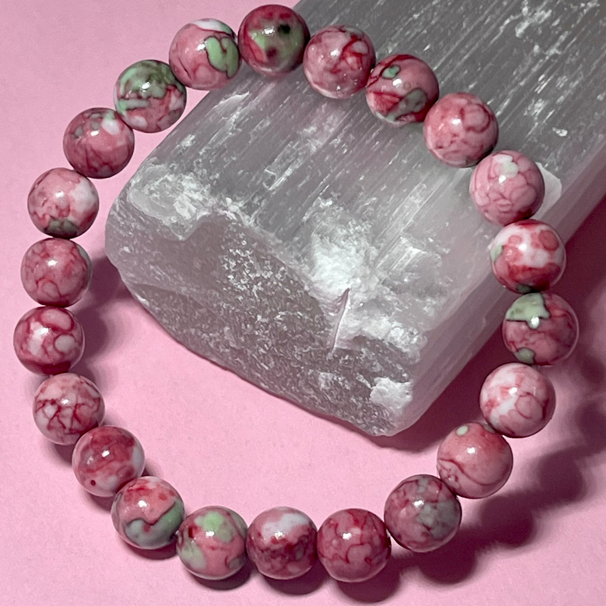 Rain Flower Rhyolite smooth round 8mm bead stretch bracelet (dyed)