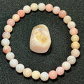 Peruvian Pink Opal smooth round 6.5mm bead stretch bracelet
