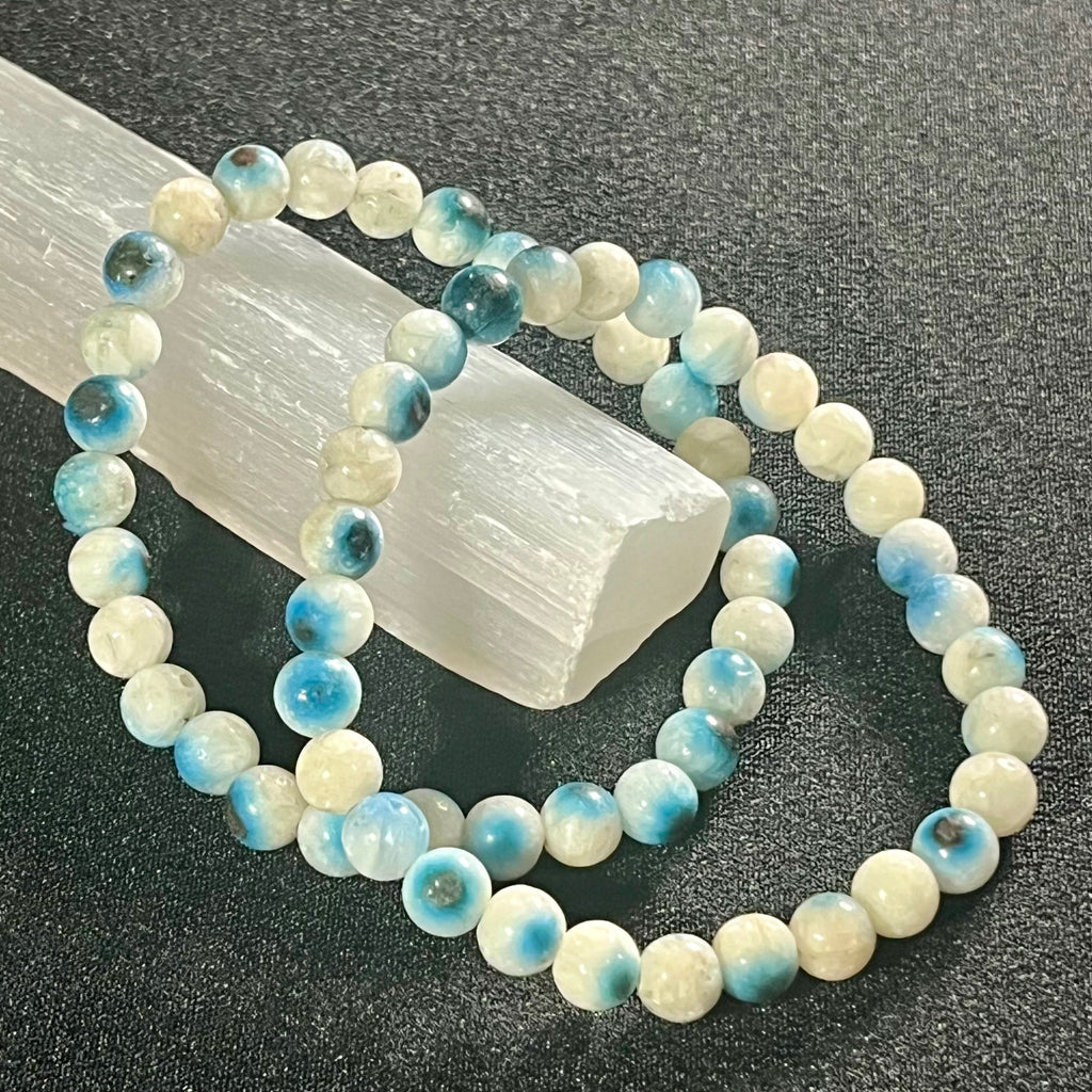 Blue Ice (Glacierite)smooth round 6mm bead stretch bracelet (A grade)