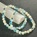 Blue Ice (Glacierite)smooth round 6mm bead stretch bracelet (A grade)