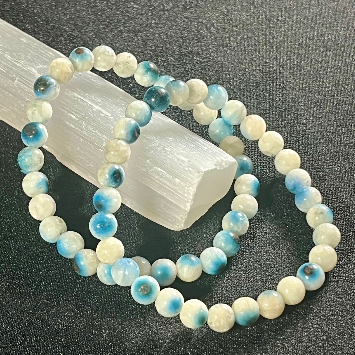 Blue Ice (Glacierite)smooth round 6mm bead stretch bracelet (A grade)