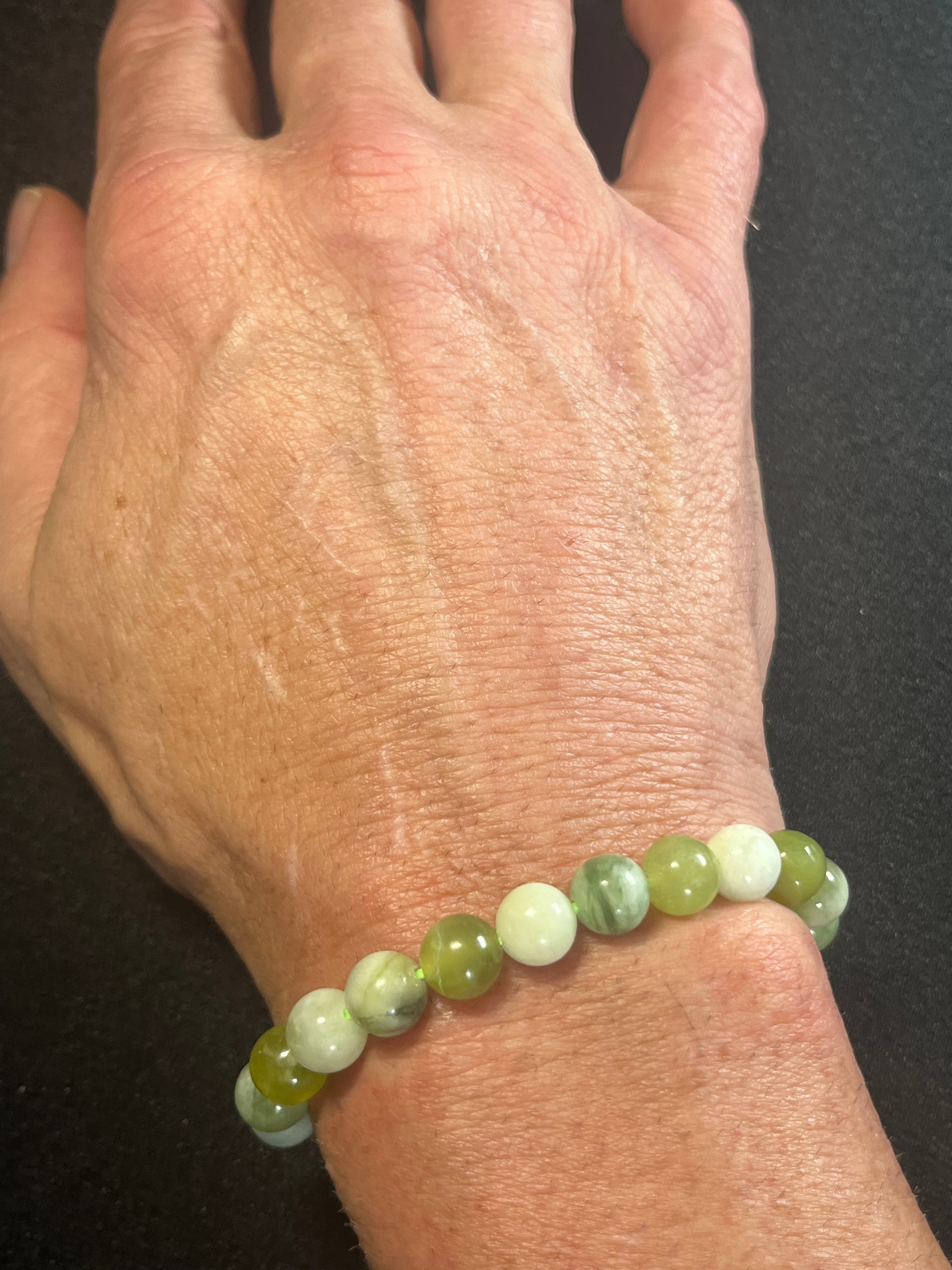 Green & White Jade smooth round 8mm bead stretch bracelet