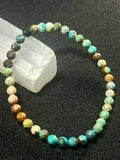 Turquoise gradient color style faceted round 5mm bead stretch bracelet; December birthstone