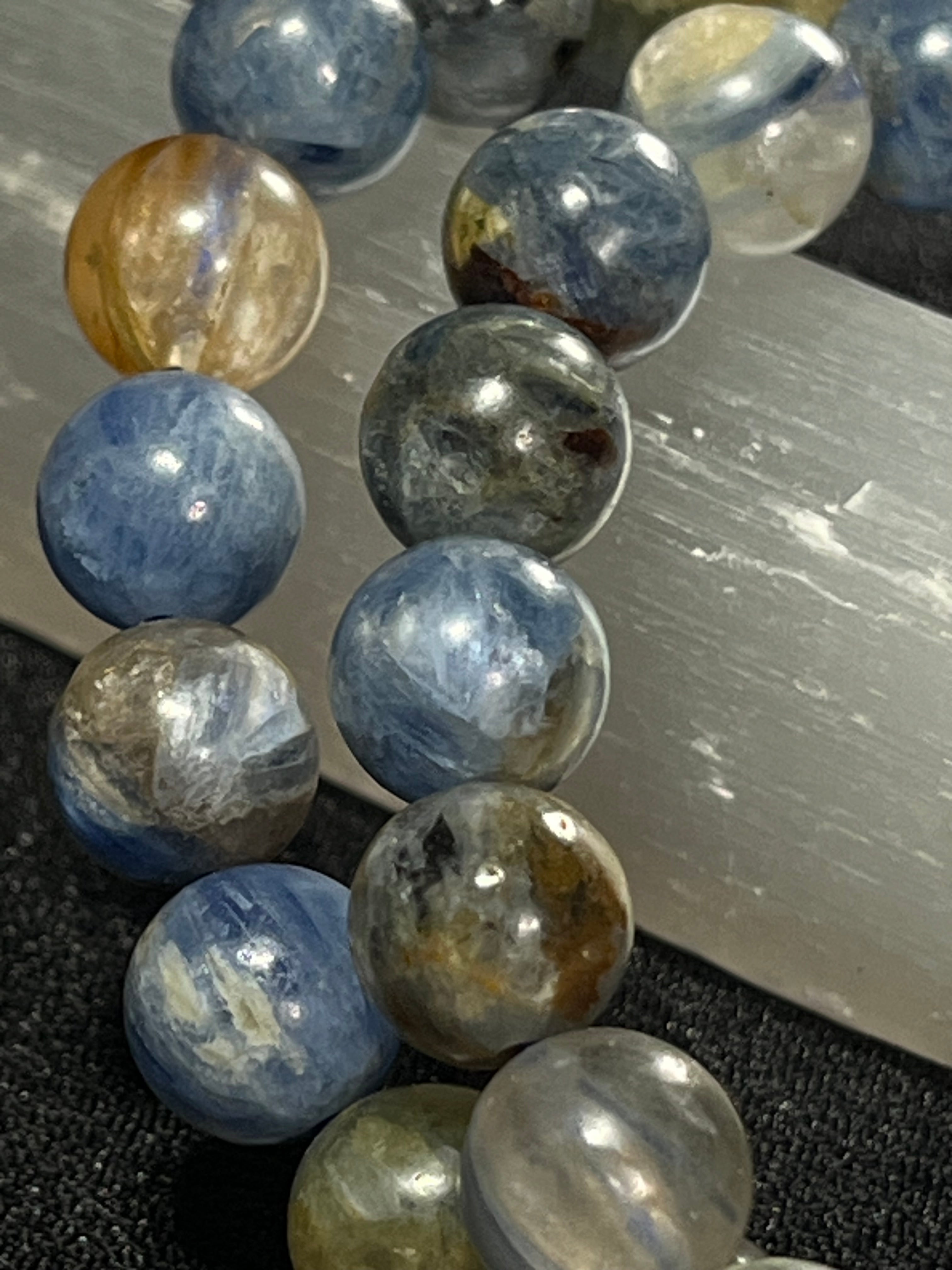 Sunset Kyanite smooth round 8mm bead stretch bracelet