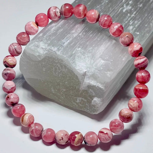 Argentina Rhodochrosite smooth round 6mm bead stretch bracelet
