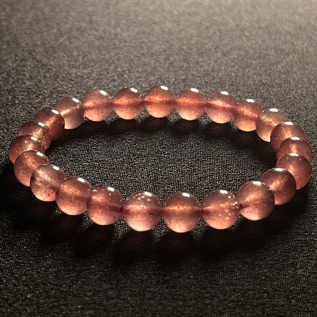 Strawberry Quartz w/ Sparkling Golden Sunstone inclusions smooth round 8mm bead stretch bracelet (AAA grade)