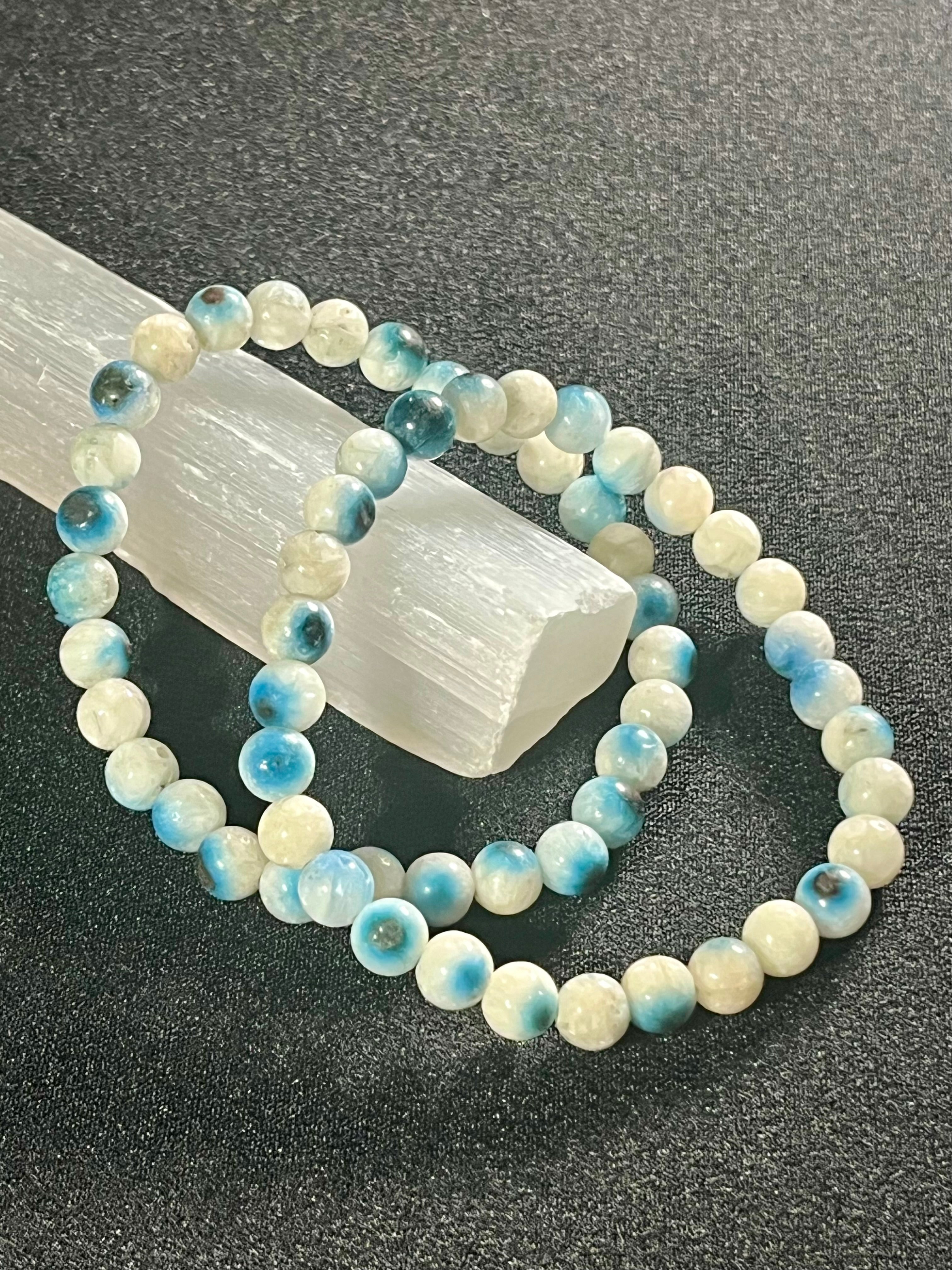 Blue Ice (Glacierite)smooth round 6mm bead stretch bracelet (A grade)