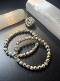 Dalmatian Jasper faceted round 6mm bead stretch bracelet